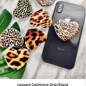 Finger grips/phone stands